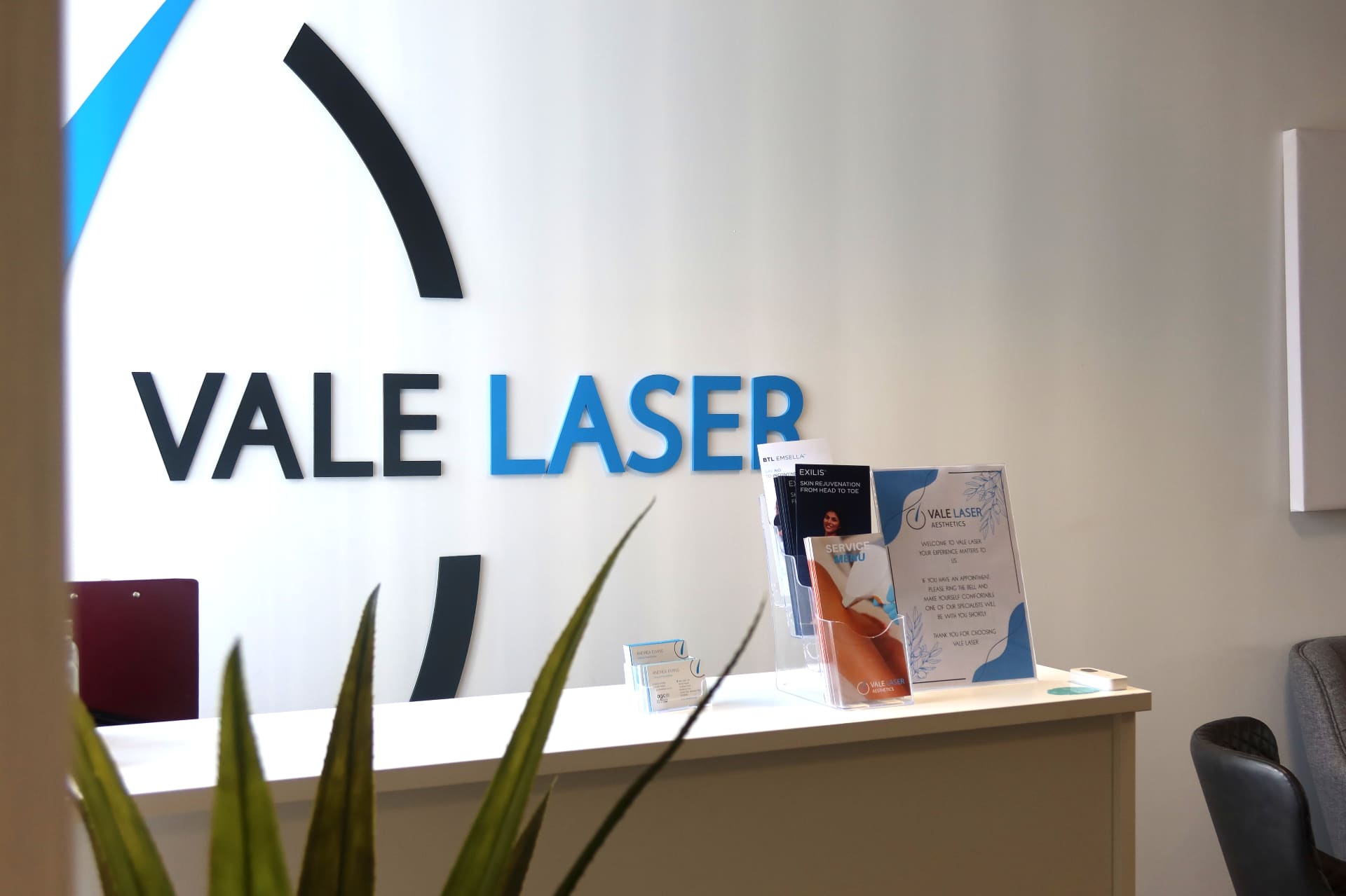 Vale Laser Aesthetics reception desk and signage at Cardiff Gate