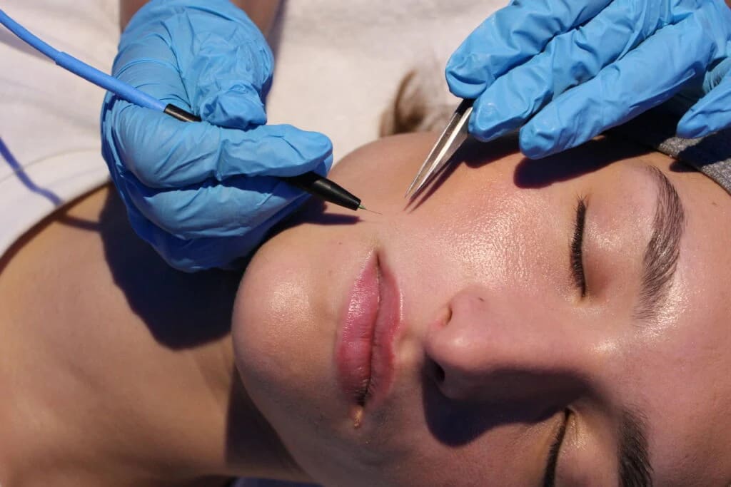 Client relaxing during a treatment consultation at Vale Laser Aesthetics